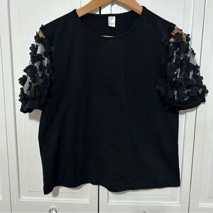 women's black top with 3D floral mesh puff sleeves, M